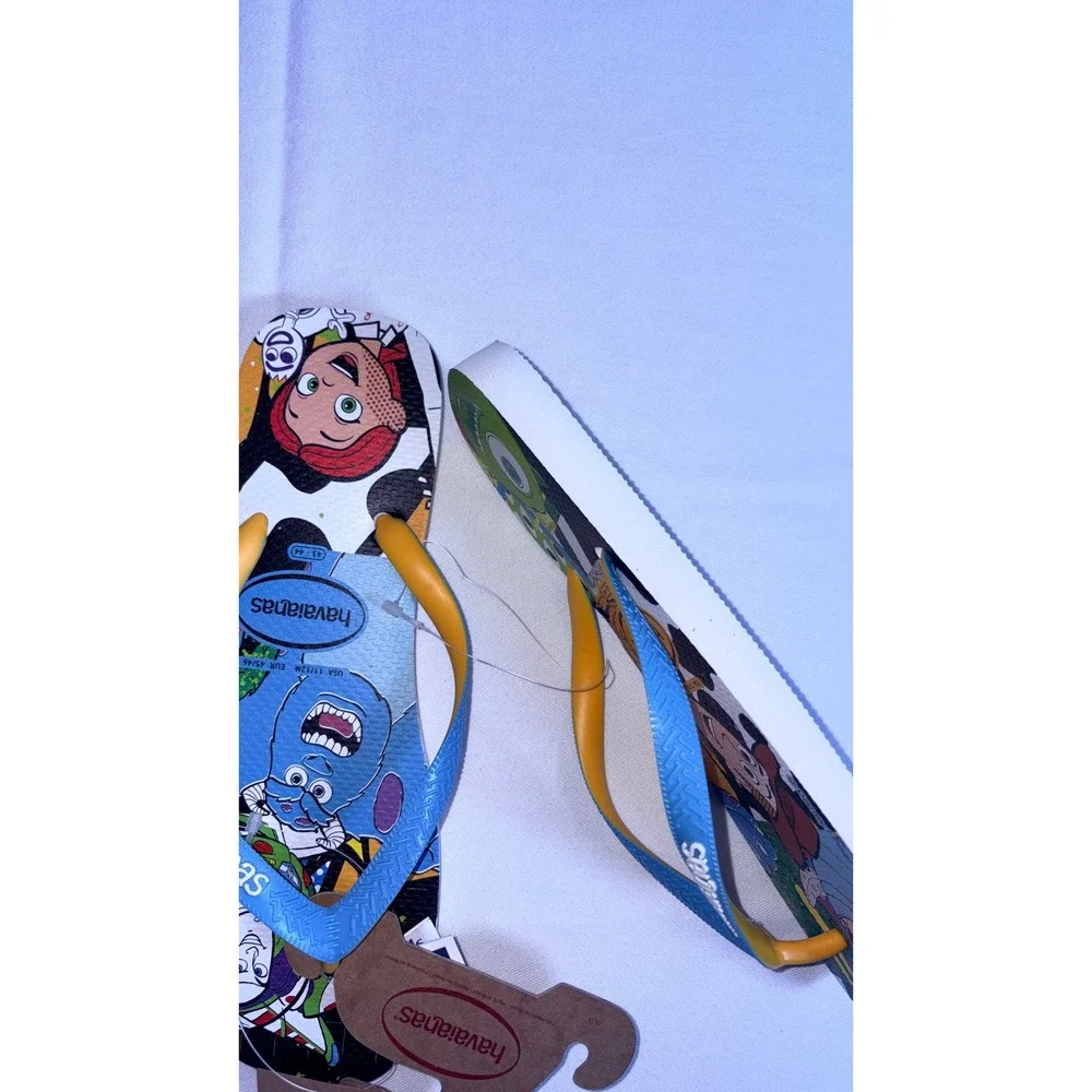 Havaianas Disney Pixar Flip Flops Size 11/12 White/Blue NEW Woody Buzz Sulley